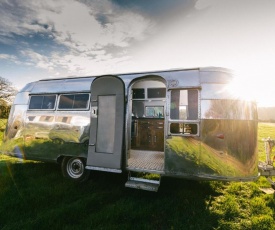 Silver Airstream Glamping & Rental